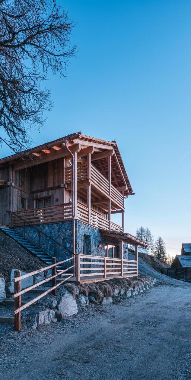 Chalets under a blue sky.