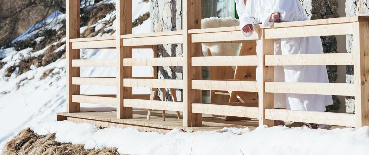 A couple on the terrace of Ciasa Rosina